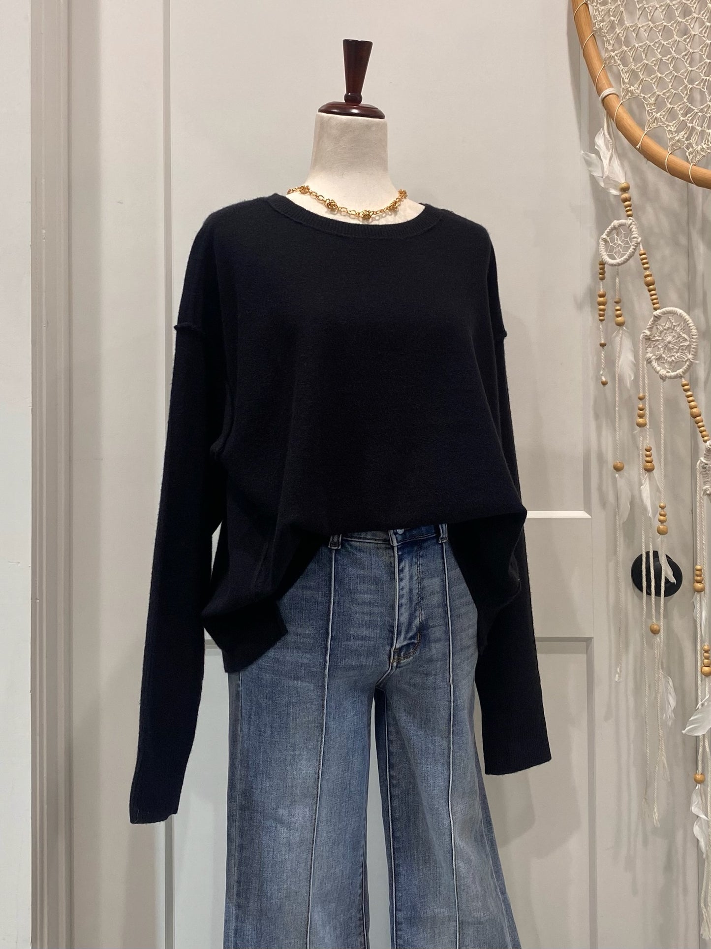Exposed Seams Black Sweater