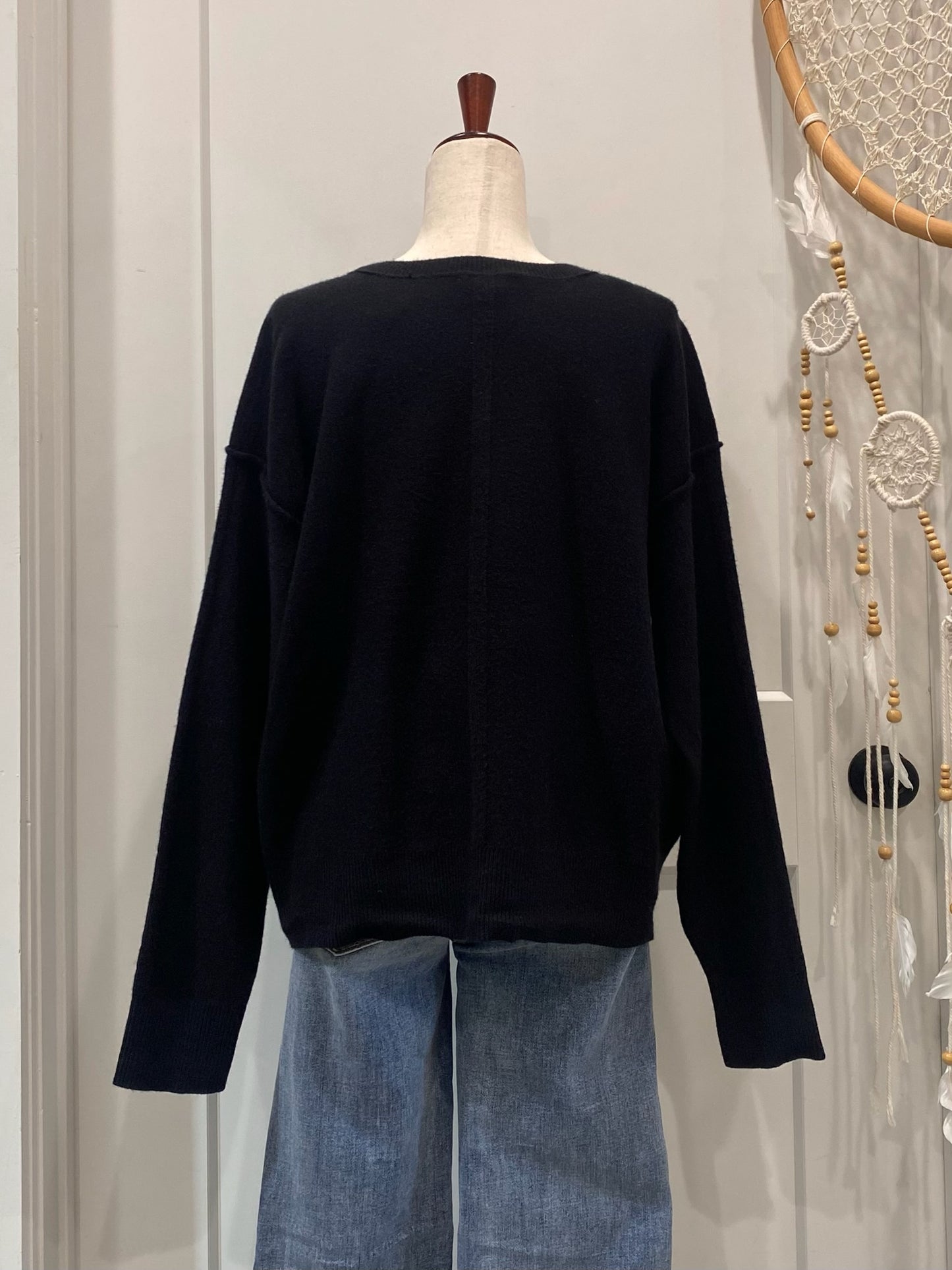 Exposed Seams Black Sweater